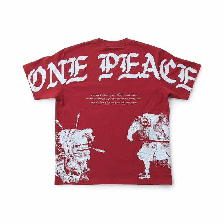 Red t-shirt with white text and graphics on a white background